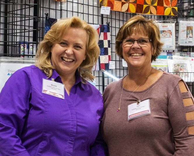 Two women at Quilt Exhibit