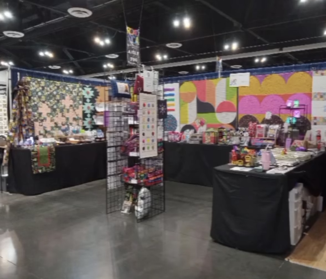 booth display with fabric and notions