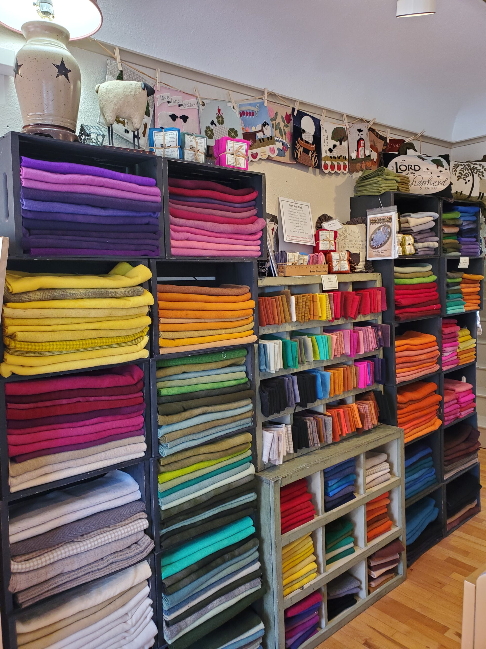 Multi-color fabric display at Carriage Country Quilt Shop