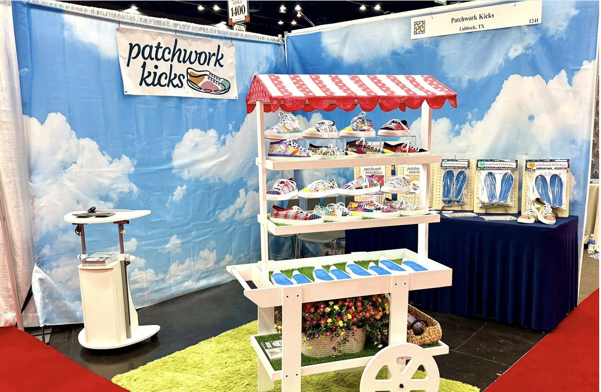 Patchwork Kicks vendor booth w/ cart display of completed kits
